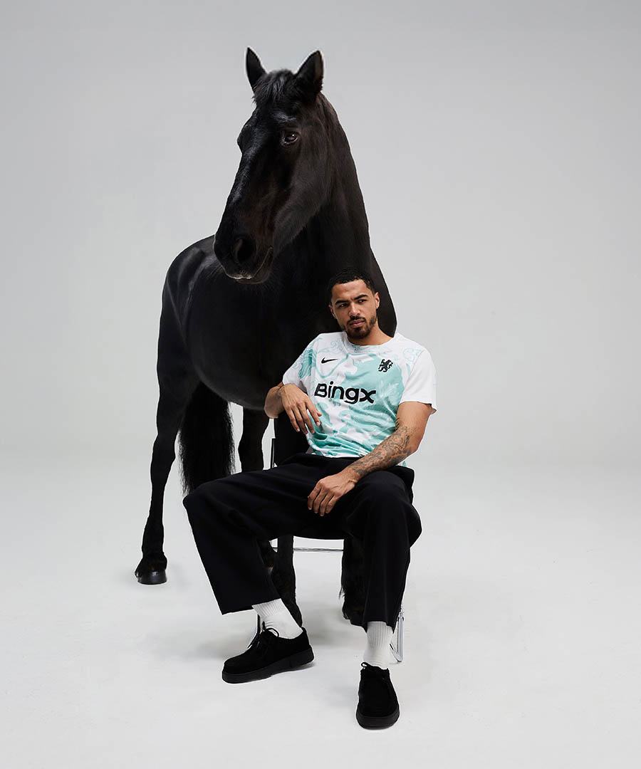 Camisa pré-jogo do Chelsea Ano do Cavalo 2026 Nike