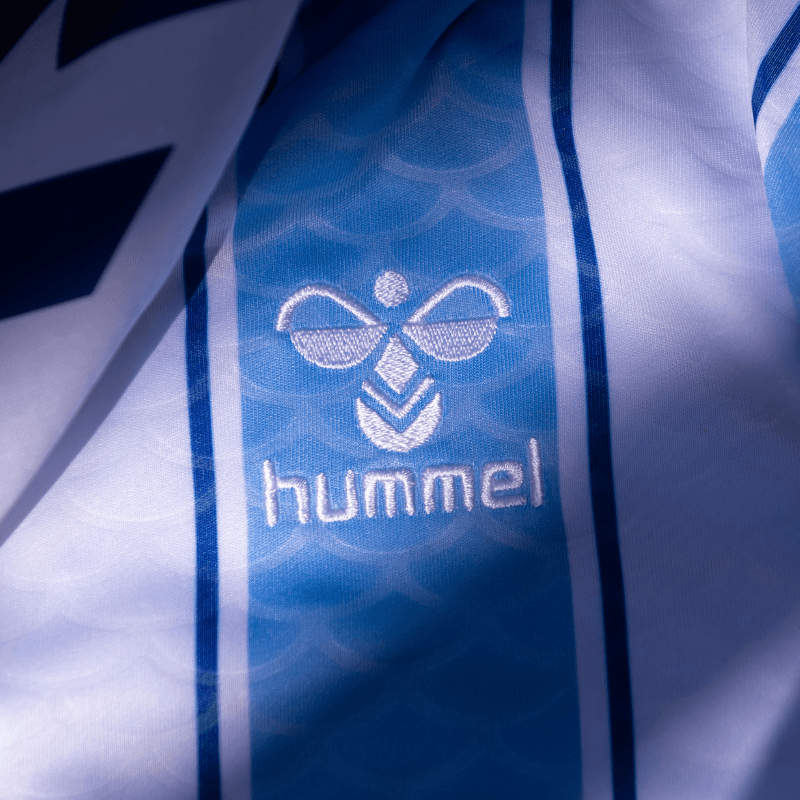 camisa titular malaga 2026-2027 hummel